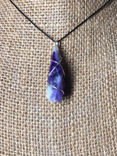 Purple crystal- wrapped glow necklace
